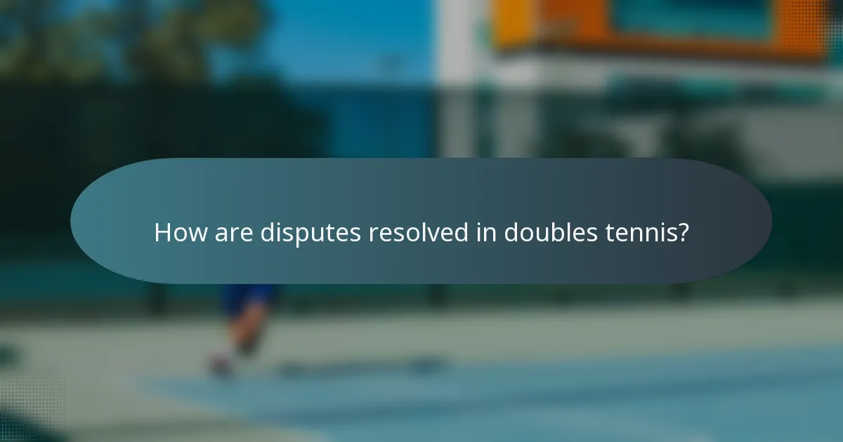 How are disputes resolved in doubles tennis?