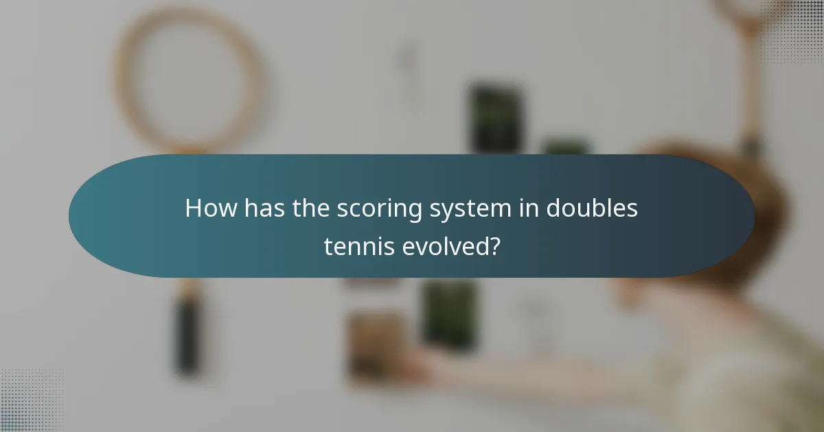 How has the scoring system in doubles tennis evolved?